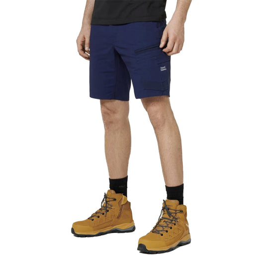 Hard Yakka Raptor Active Mid Short, designed for durability and comfort, features reinforced high-wear zones, functional pockets, and reflective logos, incorporating 38% recycled REPREVE® polyester for sustainable performance.