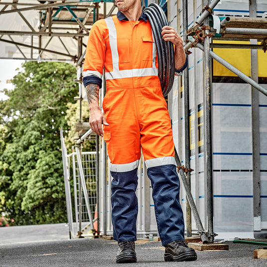 Syzmik TTMC-W17 Cotton Overall featuring durable 100% cotton drill fabric, chest pockets with tape and zipper closures, large cargo pocket, triple-stitched crotch, side and back pockets, ideal for safety workwear.
