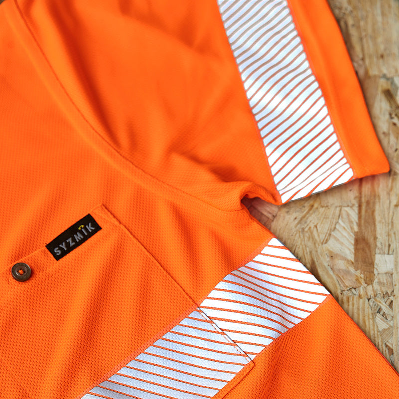 Load image into Gallery viewer, Syzmik Hi Vis Segmented Taped Polo Shirt; a close-up of a breathable, moisture-wicking polo with a chest pocket and segmented tape, ideal for active, safety-focused environments.