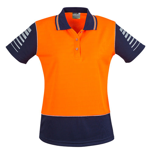 Syzmik Ladies Hi Vis Zone S/S Polo Shirt features a short-sleeve design with 3M™ reflective piping, ideal for safety work environments. Made from breathable polyester, it includes sleeve print details for a professional look.