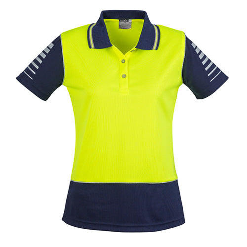 Syzmik Ladies Hi Vis Zone S/S Polo Shirt featuring moisture-wicking polyester, reflective piping, and sleeve design, ideal for active safety environments. Women's fit ensures comfort and high visibility for workplace safety.