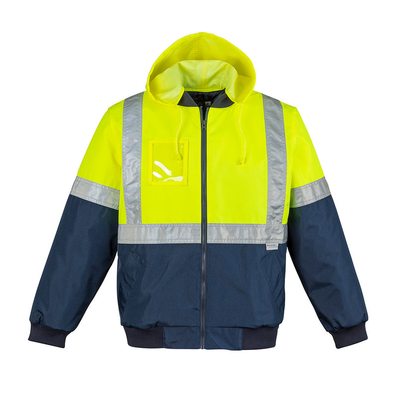 Load image into Gallery viewer, Syzmik Hi Vis Quilted Flying Jacket featuring a quilted lining, reflective tape, and concealed hood, ideal for safety and comfort. Designed with waist pockets and a chest pocket for practical outdoor use.