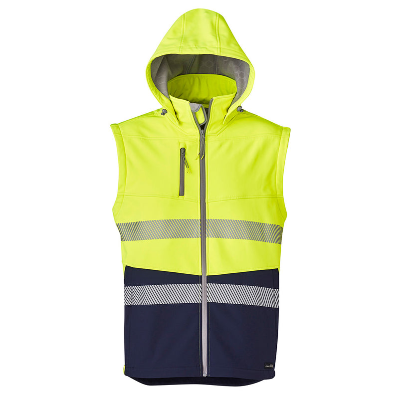 Load image into Gallery viewer, Syzmik 2-in-1 Stretch Soft Shell Taped Jacket featuring a detachable hood and sleeves, visible bio motion segmented tape, and a unique fleece lining, designed for flexibility and safety in work environments.