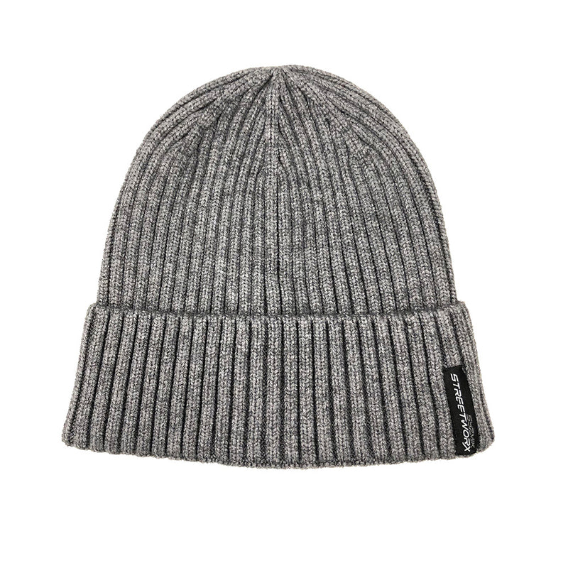 Load image into Gallery viewer, Syzmik Streetworx Beanie, a grey knit hat with a prominent label, designed for warmth and comfort, ideal for winter wear. Made from 100% acrylic, perfect for safety-conscious work environments.