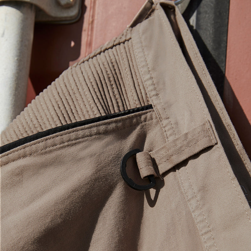 Load image into Gallery viewer, Syzmik Streetworx Stretch Pant features a modern slim fit with elastic cuff hem and black bonded zips. Enhanced with stretch pleating for comfort, the pants include multiple functional pockets for practical use.