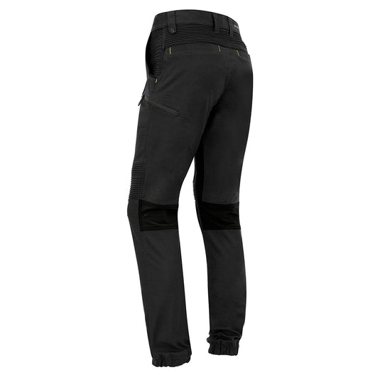 Syzmik Streetworx Stretch Pant featuring stretch pleating for added flexibility, elastic cuff hem, and multiple pockets with black bonded zips, ideal for safety and workwear needs from Active Safety.