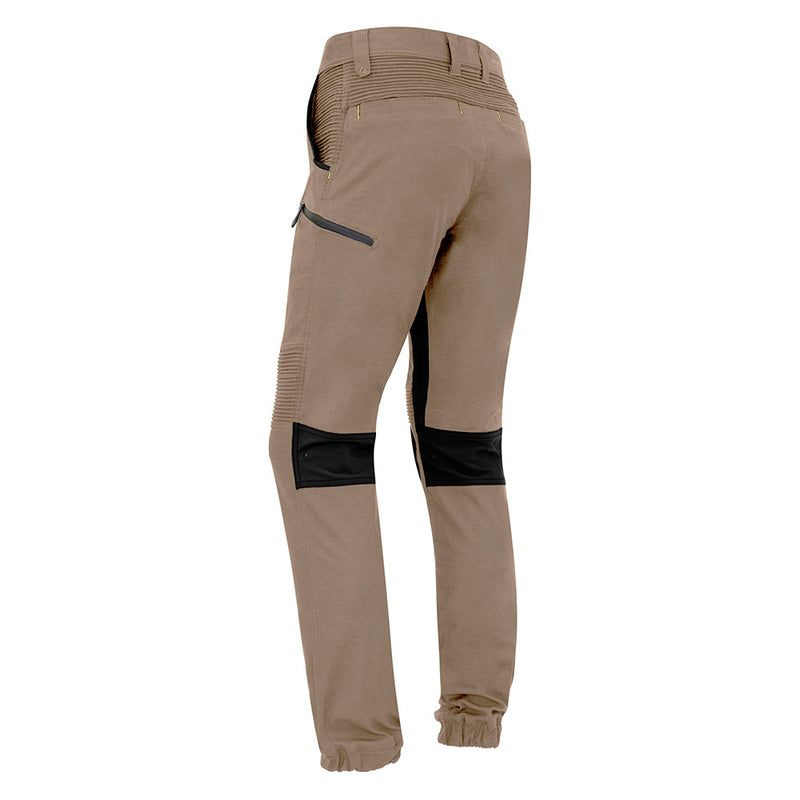 Load image into Gallery viewer, Syzmik Streetworx Stretch Pant featuring black patches, elastic cuff hems, and multiple pockets with black bonded zips. Ideal for workplace safety and comfort, emphasizing functionality and modern design.