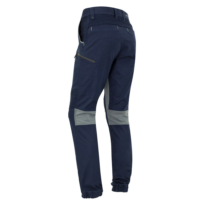 Load image into Gallery viewer, Syzmik Streetworx Stretch Pant featuring a modern slim fit with elastic cuff hem, multiple functional pockets, and stretch pleating for enhanced mobility, ideal for active safety work environments.