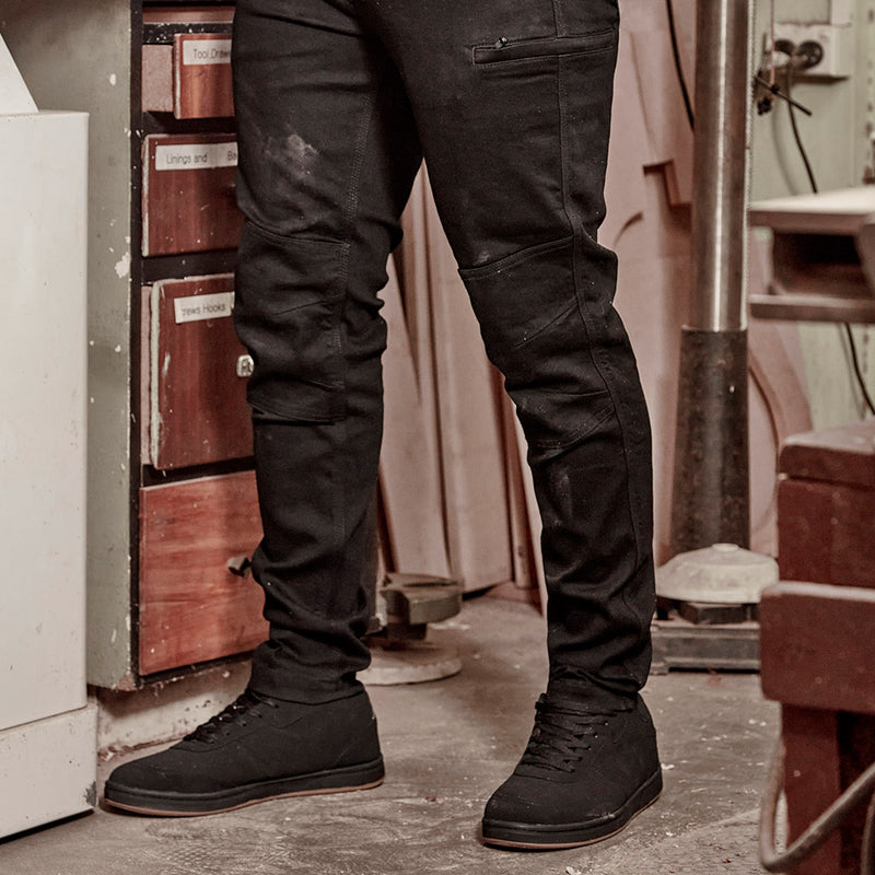 Load image into Gallery viewer, Syzmik Mens Streetworx Stretch Jean featuring a slim fit with triple-stitched crotch panel, double-layer knee, large zip side pocket, and multiple utility pockets, perfect for durable and flexible workwear.