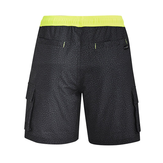 Syzmik Streetworx Stretch Board Short featuring black fabric with yellow trim, designed for work and surf with quick-dry, 360-degree stretch, multiple pockets with drainage, and reinforced stress points.