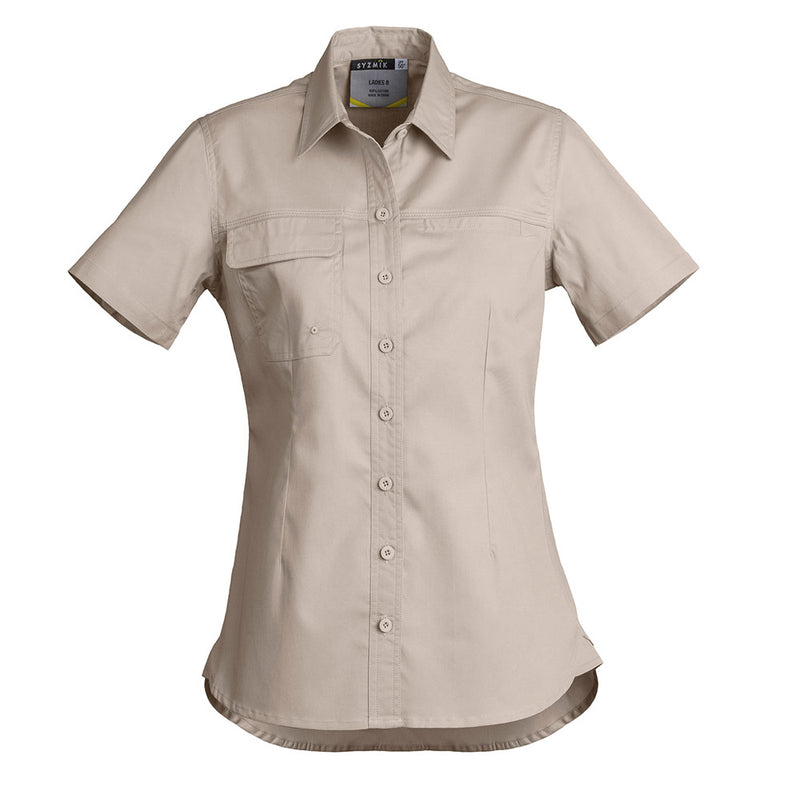 Load image into Gallery viewer, Syzmik Womens Lightweight Tradie S/S Shirt featuring a close-up of the button flap pocket, showcasing the durable triple-stitched seams and underarm vent eyelets for enhanced breathability and comfort.