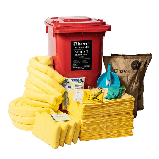Chemical Spill Kit 200 Litre featuring a red wheeled bin, yellow chemical sorbent pads, socks, and pillows for spill management, visible with accompanying safety gear and waste bags.