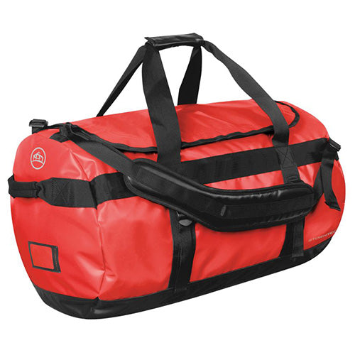 Load image into Gallery viewer, Stormtech Waterproof Gear Bag - Medium, featuring black straps, adjustable padded shoulder straps for backpack-style carrying, and an ID pocket, offering durability and versatility for storing essentials securely.