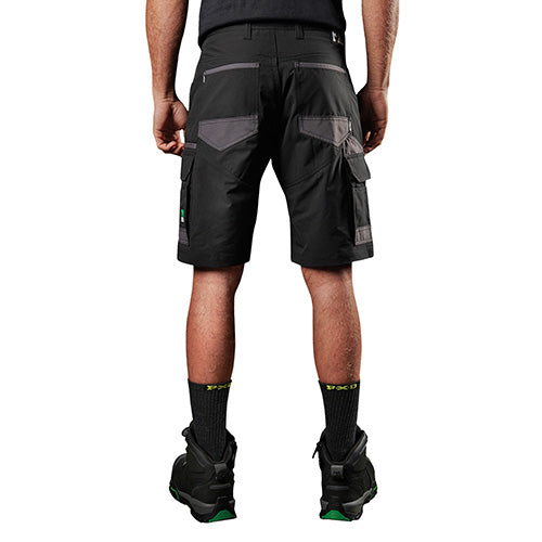 Load image into Gallery viewer, FXD LS-1 Lightweight Stretch Work Short, showcased on a model, designed with durable DURA500™ panels and utility pockets, ideal for safety and work environments.
