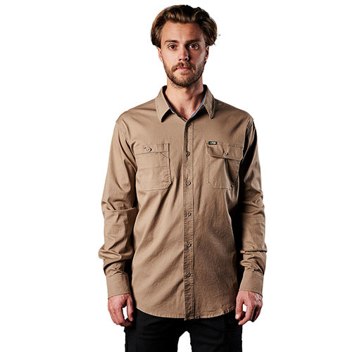 FXD LSH-1 Long Sleeve Work Shirt featuring a tailored fit, dual button-down chest pockets, and triple needle seams, modeled by a man, ideal for workplace comfort and flexibility.