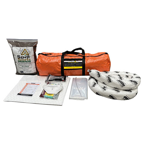 SpillTech Oil Spill Kit 25 Litre on a table, featuring various components like oil absorbent pads, a sock, disposal bag, and safety gear, designed for hydrocarbon spill management.