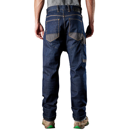 Load image into Gallery viewer, FXD WD-1 Original Knee Pad Denim Work Jeans, worn by a man, showcasing durable S-Gene® Denim with DURA500™ abrasion panels, designed for high resilience in demanding work environments.