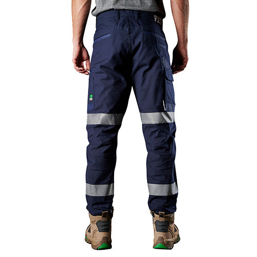 Load image into Gallery viewer, FXD WP-3 Reflective Stretch Work Pant worn by a man, featuring reflective stripes and durable pockets, designed for comfort and movement, ideal for safety-focused work environments.