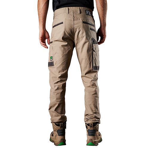 Man wearing FXD WP3 Stretch Work Pant, featuring a regular fit with slimmer legs and abrasion-resistant pocket panels, designed for ultimate comfort and movement, ideal for active safety environments.