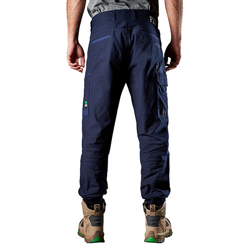 FXD WP-4 Stretch Cuffed Work Pants shown on a man, highlighting their regular fit, slimmer leg, and elastic cuffed ankles. Ideal for comfort and movement, perfect for active safety needs.