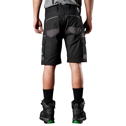 FXD WS1 Original Work Short, worn by a man, showcases durable construction with reinforced pockets and advanced nylon for high-performance work environments, embodying Active Safety’s emphasis on quality workwear.