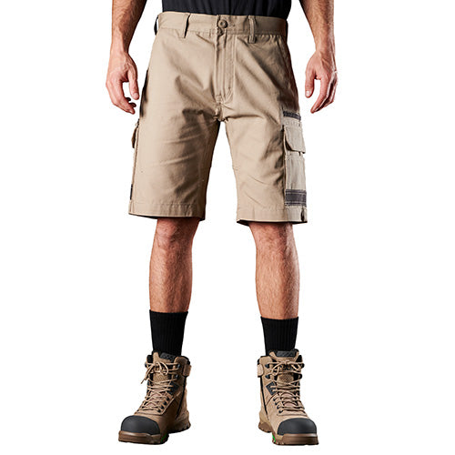 Load image into Gallery viewer, FXD WS1 Original Work Short showcased on a standing man, highlighting its durable construction with 8.2-ounce Tensile 280™ cotton canvas and DURA500™ abrasion-resistant fabric, ideal for safety and workwear environments.