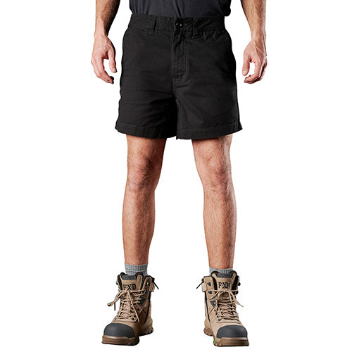 Man wearing FXD WS-2 Short Work Shorts, featuring durable DURA500™ abrasion panels, showcasing functional workwear suitable for active safety environments, ideal for durability and protection in demanding conditions.