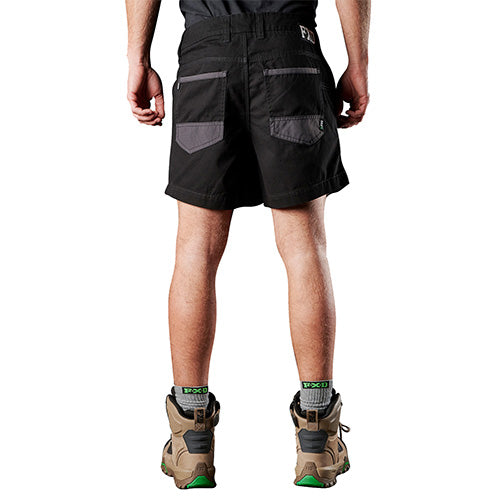 Load image into Gallery viewer, A man wearing FXD WS-2 Short Work Shorts, designed with soft cotton twill and durable DURA500™ panels, showcasing rugged workwear ideal for active safety and workplace environments.