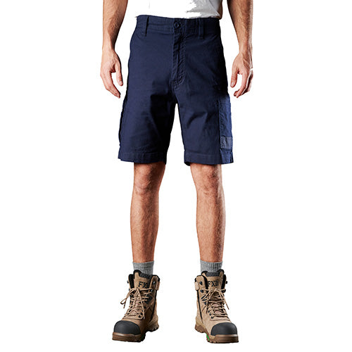 FXD WS-3 Stretch Work Short, worn by a standing man, showcases a regular fit with a slimmer leg, featuring abrasion-resistant pocket panels ideal for active work environments.
