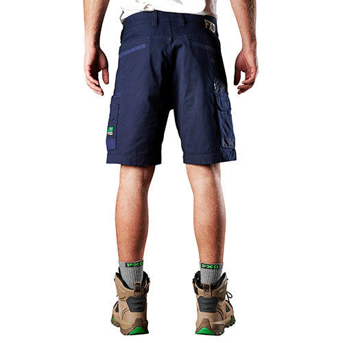 Load image into Gallery viewer, FXD WS-3 Stretch Work Shorts on a man, showcasing their regular fit with a slimmer leg and durable abrasion panels, ideal for comfort and movement in active work environments.