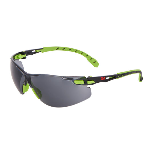 3M Solus Safety Glasses, Smoke Lens: Wrap-around style with smoke-tinted lens and black frame. Features bright green rubberized nose pads and temple arms for comfort. Red 3M logo on the side.