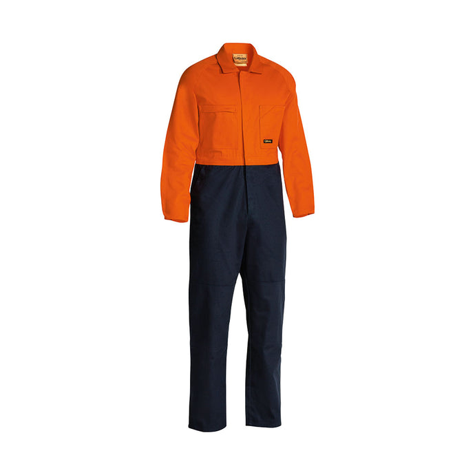 Bisley Hi Vis Cotton Drill Coverall, a durable work garment with bright orange upper and navy lower, features multiple pockets, double-layered knees, and antimicrobial treatment, ideal for industrial safety and visibility.