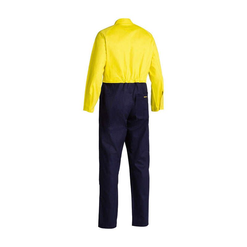 Load image into Gallery viewer, Bisley Hi Vis Cotton Drill Coverall, featuring a bright yellow top and navy blue bottom, showcases double-layered knees, multiple pockets, and metal press studs, designed for durability and workplace safety.
