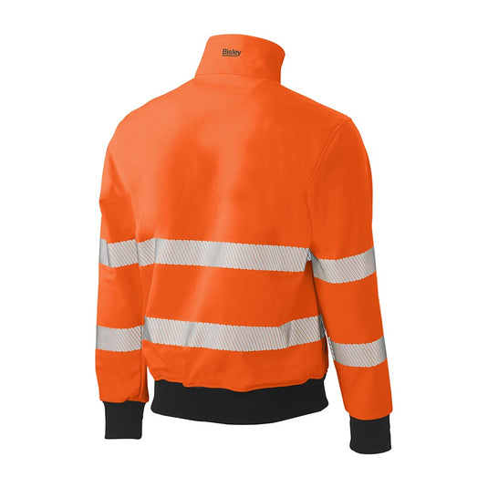Bisley Hi Vis Soft Shell Bomber Jacket, featuring reflective tape bands and biomotion taping on sleeves, shown from the back with ribbed cuffs and hem for warmth.