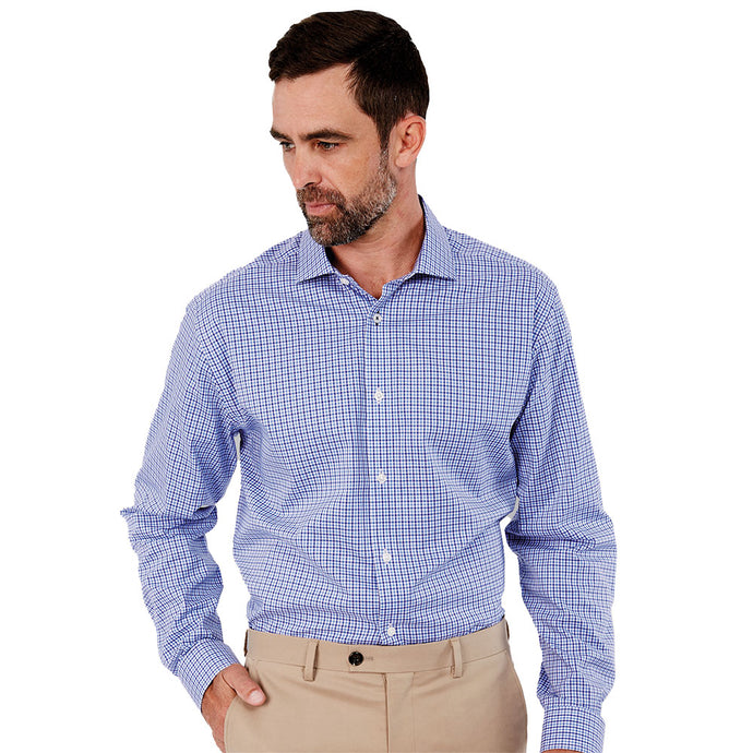 Barkers Mens Stamford Long Sleeve Check Shirt features a close-up of a man's face wearing a blue and white checkered shirt, showcasing its 100% cotton tattersall check and fashion collar.