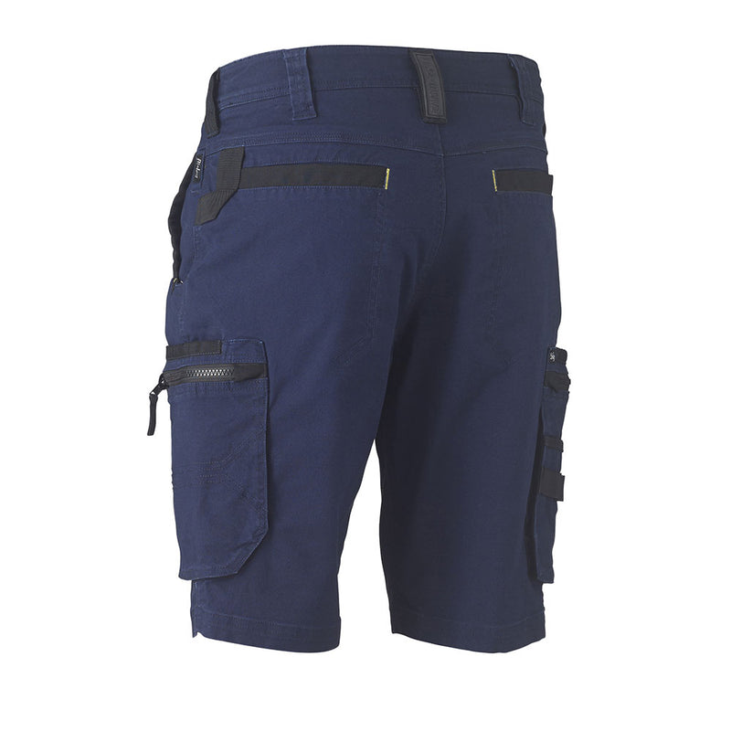 Load image into Gallery viewer, Bisley Flex &amp; Move Stretch Utility Zip Cargo Short features visible back view with belt loops, rear and side pockets with zippers and flap closures, showcasing durable stretch cotton canvas and Cordura® reinforcement.
