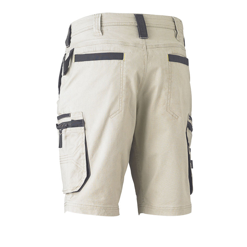Load image into Gallery viewer, Bisley Flex &amp; Move Stretch Utility Zip Cargo Short, featuring rear welt pockets, large side cargo pockets with dark trim, and belt loops, ideal for workwear in safety-focused environments.
