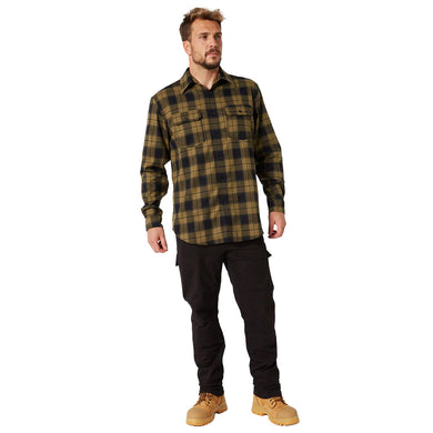 Model wearing Jet Pilot Fueled Utility Pant, showcasing articulated knees, reinforced panels, and engineered pockets designed for performance and comfort, ideal for active work environments.