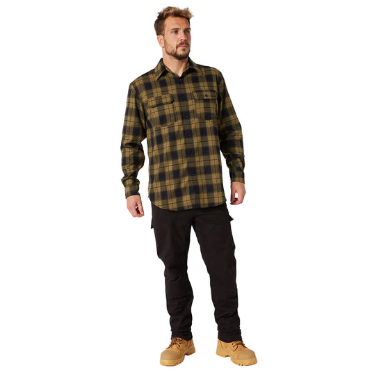 Model wearing Jet Pilot Fueled Utility Pant, showcasing articulated knees, reinforced panels, and engineered pockets designed for performance and comfort, ideal for active work environments.