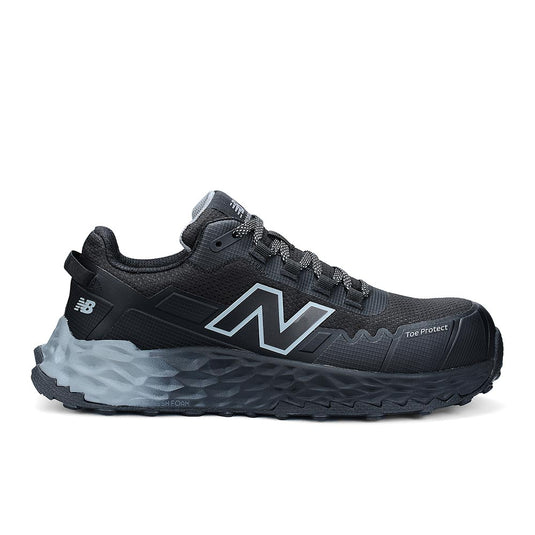 New Balance Fresh Foam Cremorne 2E Safety Shoe, Black/Grey features a durable mesh upper, reinforced Toe Protect bumper, Fresh Foam midsole, and composite safety toe, ideal for comfort and protection at work.