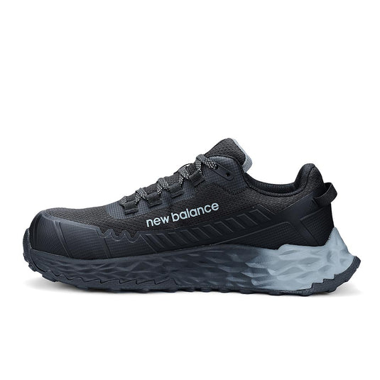 New Balance Fresh Foam Cremorne 2E Safety Shoe in Black/Grey features a low-top athletic design with composite safety toe and slip-resistant outsole, ideal for workplace safety and comfort.