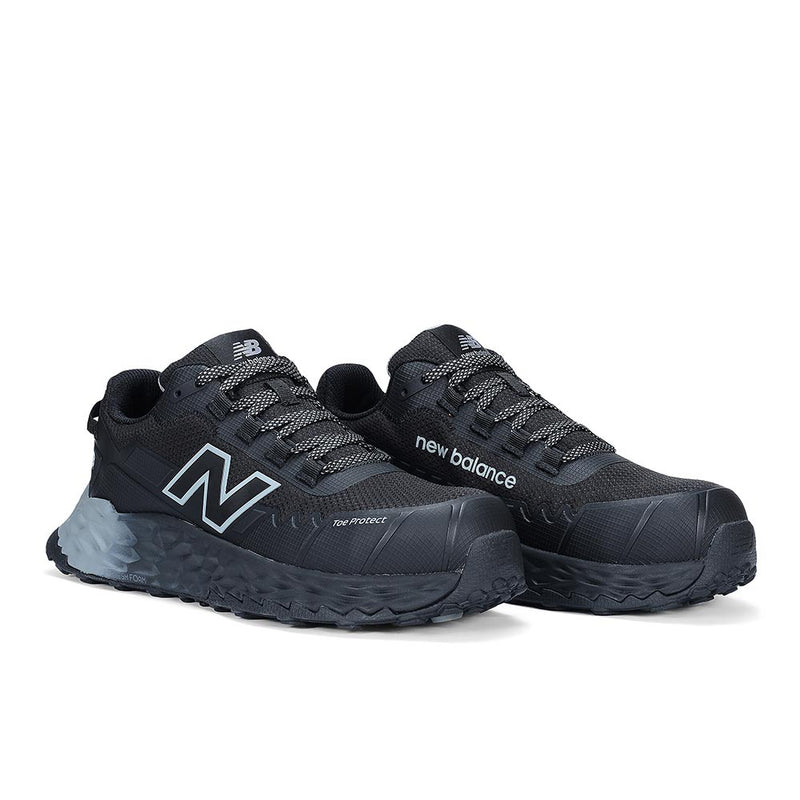 Load image into Gallery viewer, New Balance Fresh Foam Cremorne 2E Safety Shoe, Black/Grey: Low-cut, lace-up athletic shoe with chunky sole, reflective &#39;N&#39; logos, composite safety toe, slip-resistant and heat-resistant features, ideal for workplace durability and comfort.
