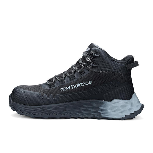 New Balance Fresh Foam Cremorne Mid 2E Safety Boot, Black/Grey, showcases a black mesh upper, tonal webbing, and a dual-tone foam midsole, designed for durability, comfort, and superior traction in safety footwear.