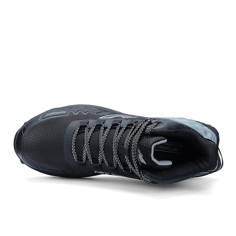 Load image into Gallery viewer, New Balance Fresh Foam Cremorne Mid 2E Safety Boot features a black mesh upper, protective toe bumper, patterned laces, and reflective accents, offering superior comfort and durability for industrial environments.

