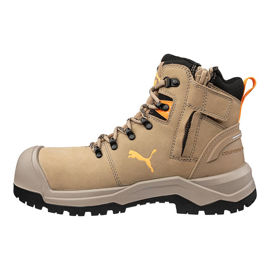 Puma Iron 6 Inch Zip Sided Safety Boot, Stone: A durable tan high-top work boot featuring a composite toe, lace-up, side zipper, Velcro strap, and a grippy black outsole with orange accents.