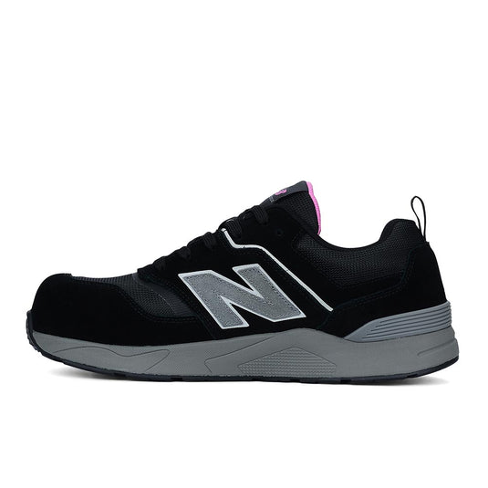 New Balance Elite Lite Womens Safety Shoe, Black/Rose, shows a black mesh and suede upper with a silver N logo, grey midsole, composite toe, and slip-resistant outsole, combining style and safety.