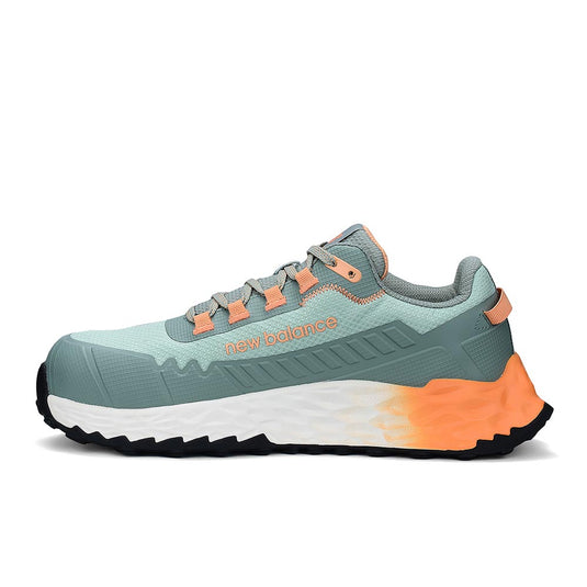 New Balance Fresh Foam Cremorne Womens Safety Shoe, Aqua/Pumpkin, showcases a mint-green trainer with peach accents, composite safety toe, white midsole, and black slip-resistant outsole, embodying comfort and durability for active work environments.