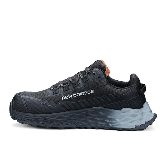 New Balance Fresh Foam Cremorne Womens Safety Shoe, Black/Grey: A black New Balance running/trail sneaker with sculpted foam midsole and side branding, offering safety features like a composite toe and slip-resistant outsole.