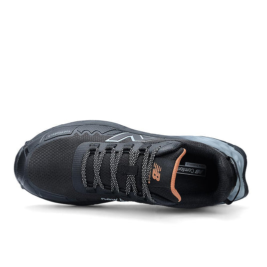 New Balance Fresh Foam Cremorne Womens Safety Shoe, Black/Grey, featuring Fresh Foam midsole, lace-up front, and orange logo, designed for comfort and protection in demanding work environments.