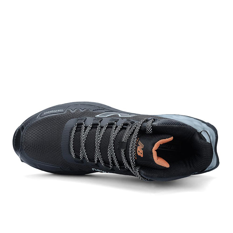 Load image into Gallery viewer, New Balance Womens Fresh Foam Cremorne Mid Safety Boot in black/grey features a trail-style design with grey overlays, patterned laces, orange heel lining, reflective accents, and toe protect marking, emphasizing safety and comfort.
